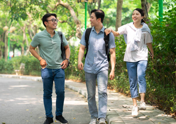 istock Photo of group Asian student outside 1456949712