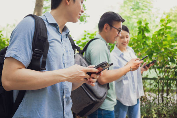 istock Photo of group Asian student outside 1456949728