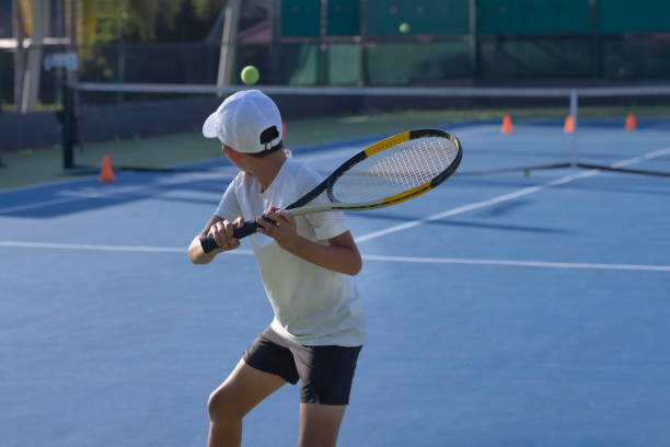 istock Child about to hit the ball 1456951496