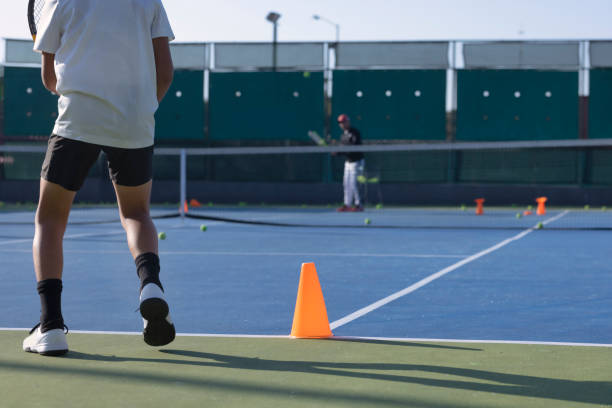 Person playing tennis