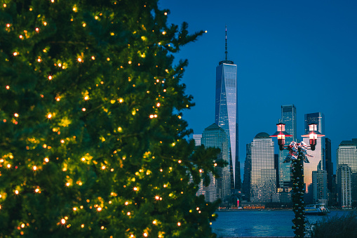 The Freedom Tower and Manhattan in the background. Jersey City Christmas tree in the foreground.