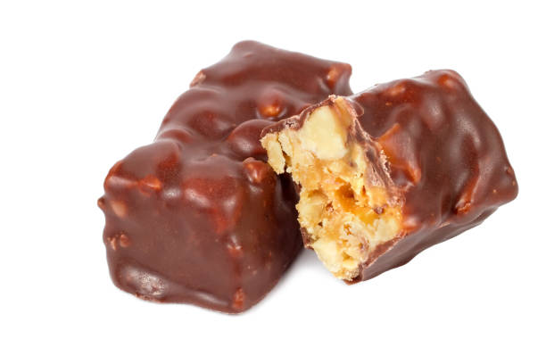 istock Chocolate candies with natural nuts. 1456958259