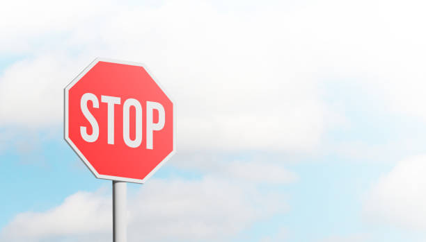 istock Conceptual stop sign with blue sky background and copy space. 3D illustration. 1456963253