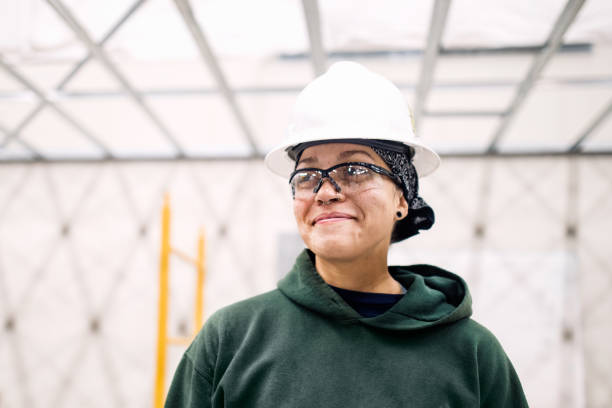 Woman Construction Worker On Job Site stock photo