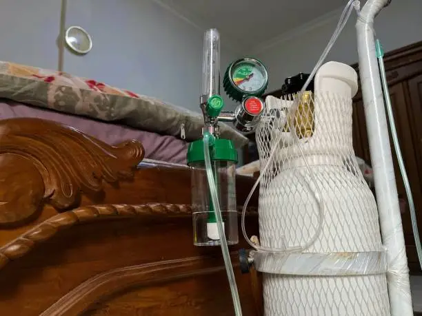 Photo of Oxygen tank featuring in a house.