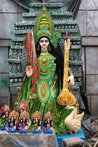 Goddess Saraswati idol is under preparation for upcoming Saraswati Puja festival at a potter's studio. Devi Saraswati is considered as the goddess of knowledge, music, art, wisdom, and learning.