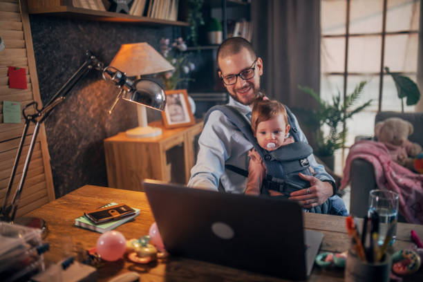istock father working from home while babysitting his baby girl 1456983594