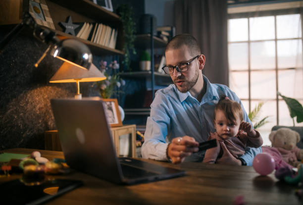 istock father working from home while babysitting his baby girl 1456984248