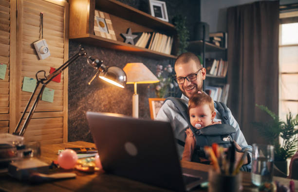 istock father working from home while babysitting his baby girl 1456984299