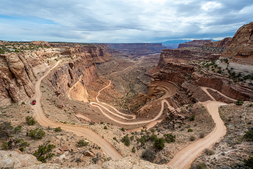 Roadtrip into the Grand Canyon at Canyonlands National Park a cloudy afternoon in Utah, United States.