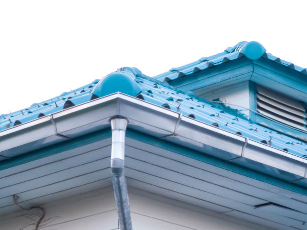 Low angle view, roof corner of a house with gutters. white background no people and isolated Roof corner of a house with gutters. white background no people and copy space with isolated steel gutters stock pictures, royalty-free photos & images