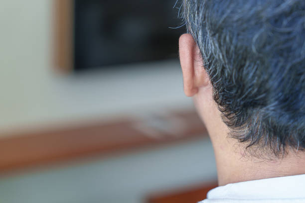 istock asian man having grey and white hair growing up. Hair problem concept 1456989534