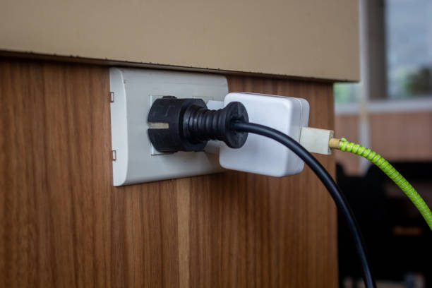 istock plug in power outlet on the wall. 1456989705