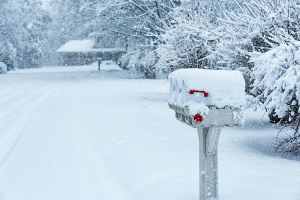 istock Blizzard Snow Storm Rural Free Delivery Roadside Mailboxes 1456991021