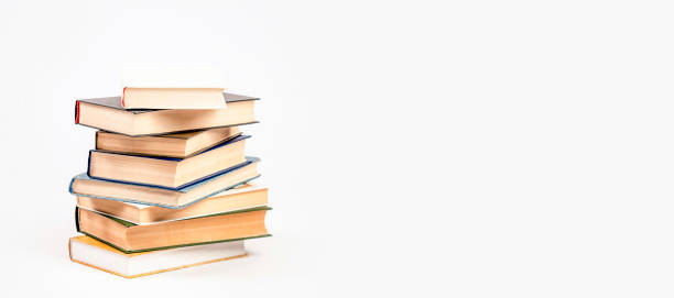 istock A stack of books on a light background. The concept of reading a paper book, learning. 1456993002