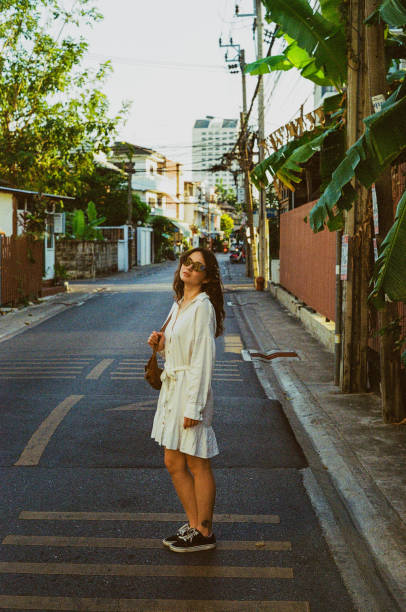 istock Woman walking in Bangkok 1456996828