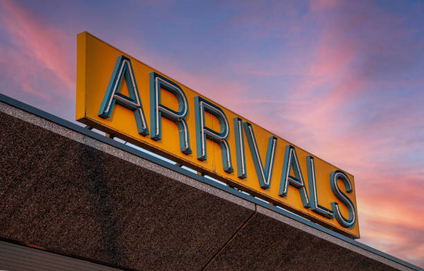 istock Airport arrivals sign at dawn 1456996855