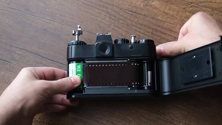 Loading film into an old film analog camera