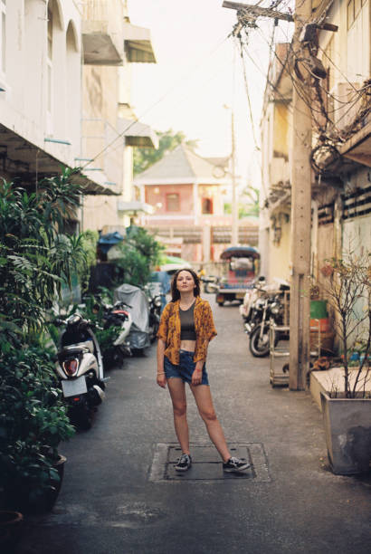 istock Woman walking in Bangkok 1456998554