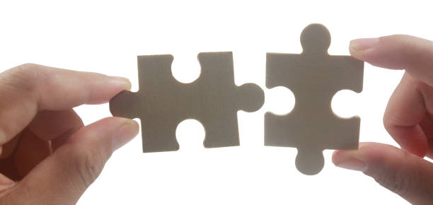 istock Connecting jigsaw puzzle. Business solutions success 1457002693