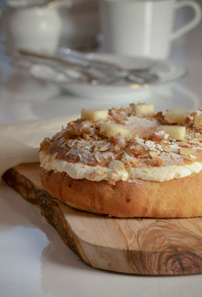 istock Roscon, Spanish sweet bread-based ring-shaped dessert, on white table 1457003333