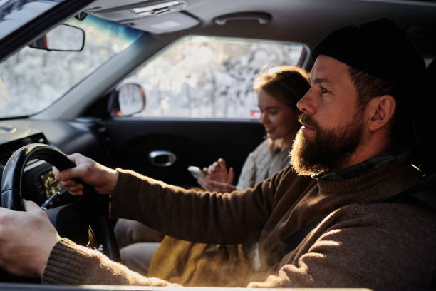 istock Serious man driving his car 1457004665