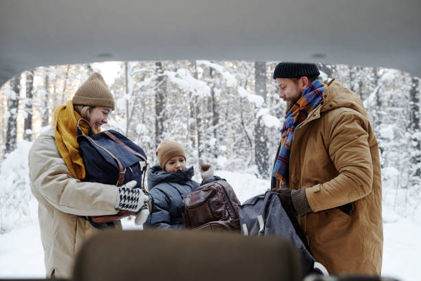 istock Family arranging picnic in the forest 1457004778