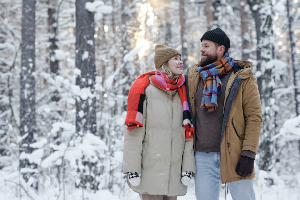 istock Young couple enjoying their winter walk 1457004874