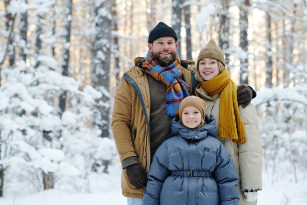 istock Family with child walking in forest 1457004973