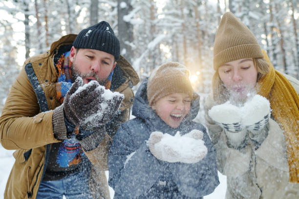 istock Family having fun during winter holidays 1457005076