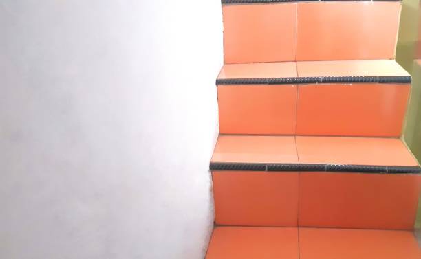 istock Asymmetrical size of stairs - human measurements error 1457005097