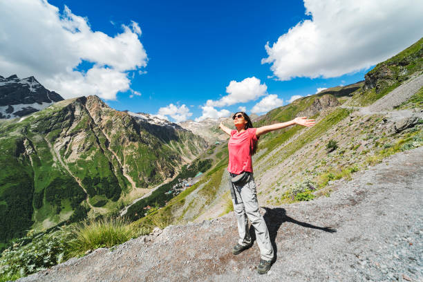 Young woman hiking in mountains