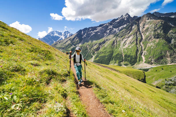 istock Little boy hiking in mountains 1457010802