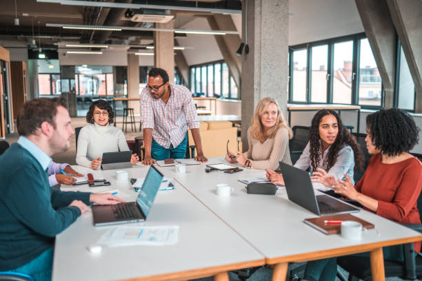 istock Big Group Of Mixed Race Business People Using Laptops to Take Notes 1457011375