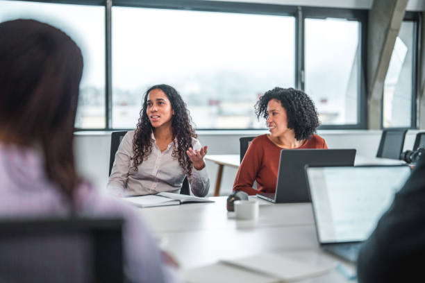 istock Two Latin Women Starting a Work Day 1457011387