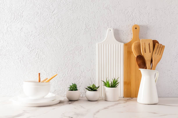istock beautiful kitchen background with various environmentally friendly utensils and equipment. white modern design of the kitchen interior. 1457011489