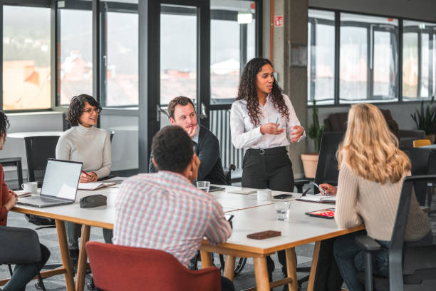 istock Latin, Black and Caucasian Work Colleagues Paying Attention During a Meeting 1457012711