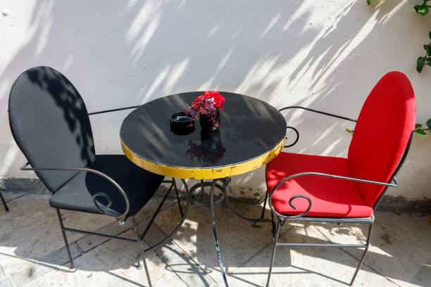 istock Table and two chairs on the street 1457012852