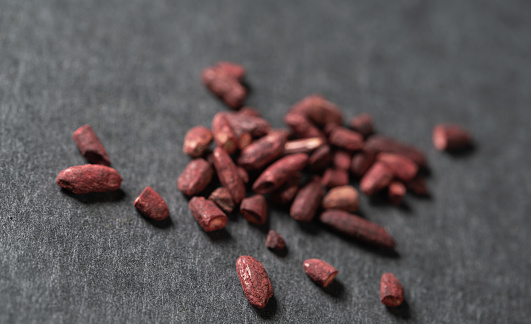 chinese medicine Red Yeast Rice on black background