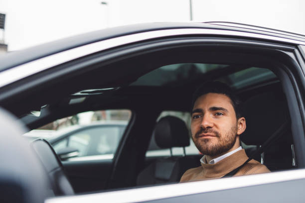 istock A man prepares to drive a car 1457027425
