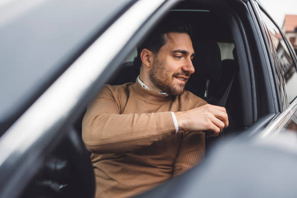 istock A man prepares to drive a car 1457027441