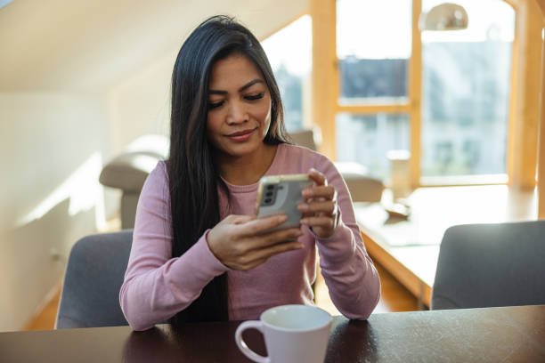 istock Asian Female Working From Home On The Laptop 1457034237