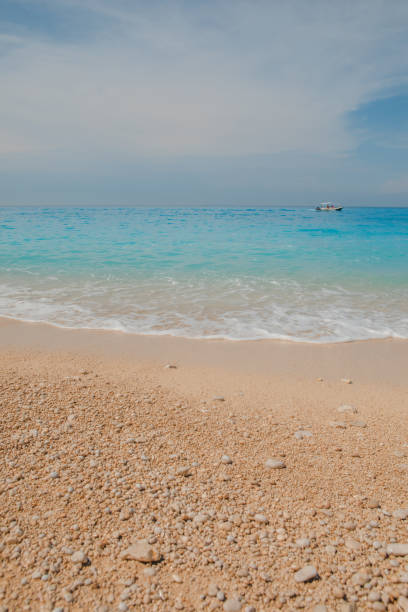 istock sea beach with white rocks and blue water 1457034942