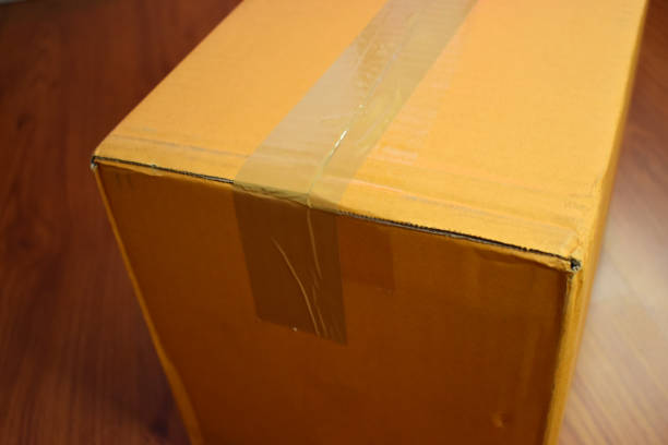 istock brown box packaging for shipping, paper textured 1457035541