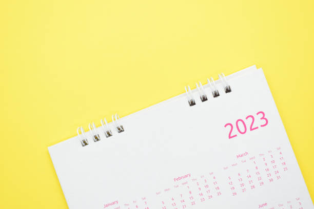 istock white calendar 2023 on yellow background 1457035642