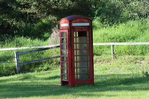 red wooden telephone booth