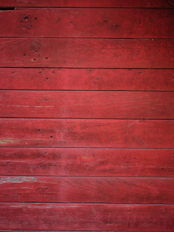 painted old wooden red wall. background texture .