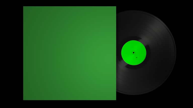 A vinyl record spinning half out of an album cover. Green screen to key out and place your own artwork. Transparent Background