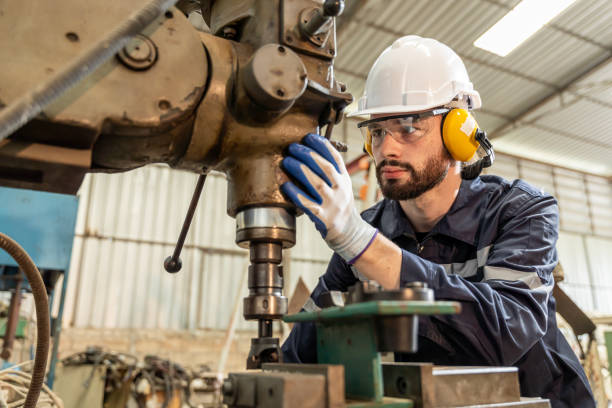 istock Team of engineers practicing maintenance Taking care and practicing maintenance of old machines in the factory so that they can be used continuously. 1457041386