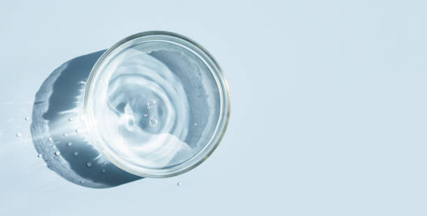 istock petri dish with liquid water on plain on a light background water ripple texture 1457048792